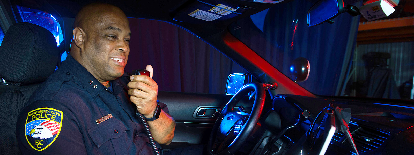 Police in the car, talking on the radio