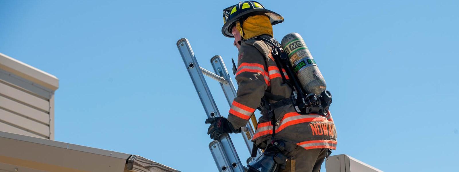 Firefighter on ladder