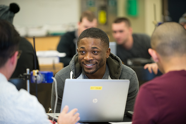 A large group of students in a classroom