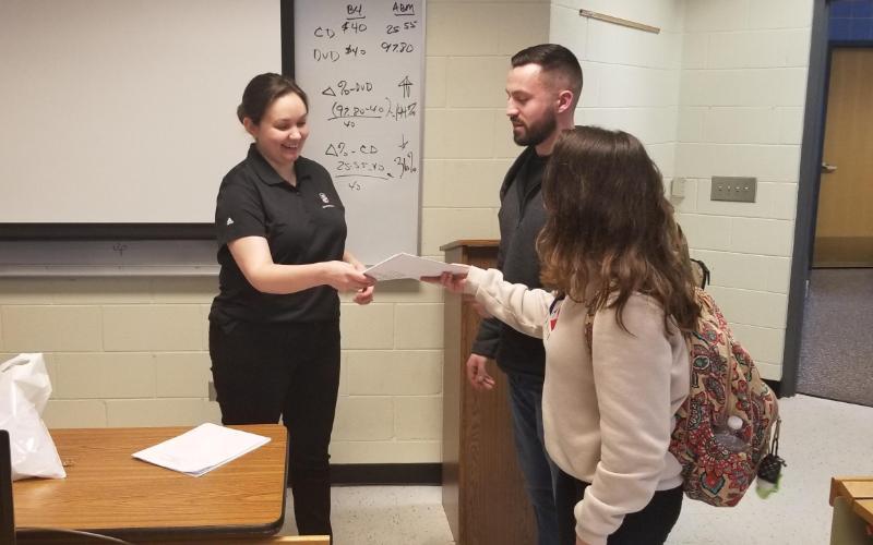 Students turn in applications for NIU accounting course
