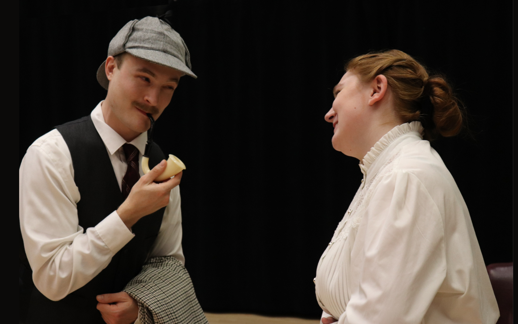 ECC students Brett Barry and Anika Thorenson in “The Game’s Afoot or Holmes for the Holidays”