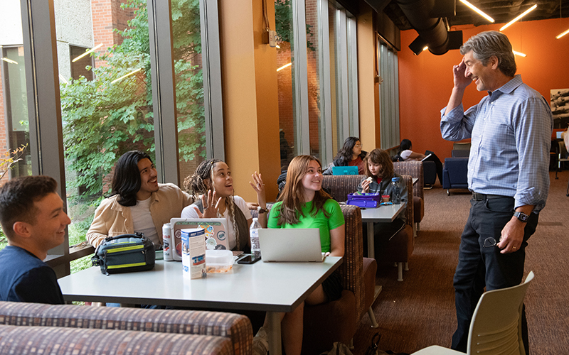 ECC students converse with David Zacker, PhD, professor of humanities