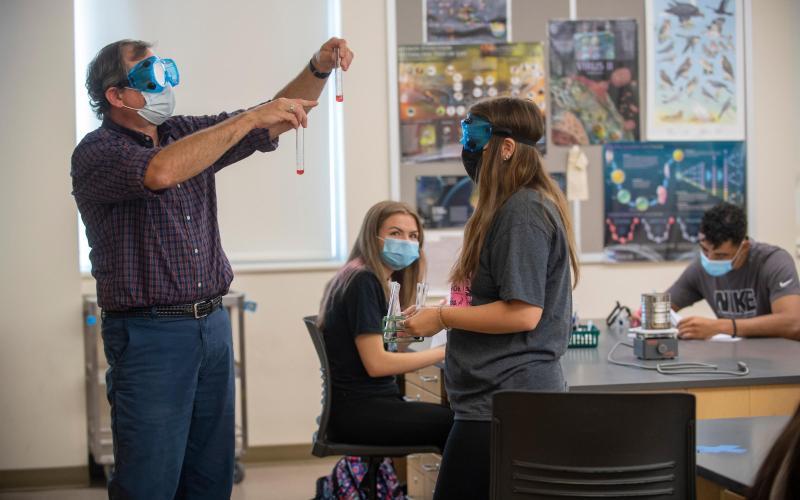 ECC students watch a demonstration during class