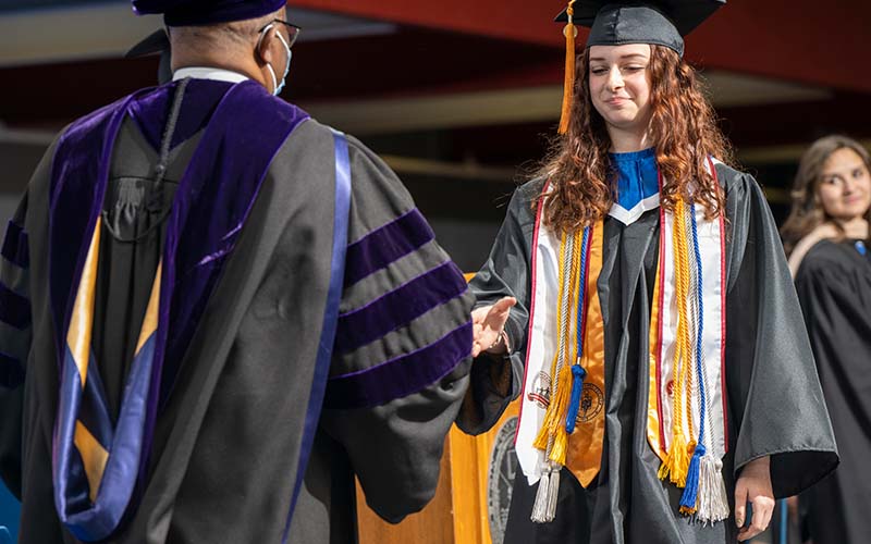 Dual credit student from St. Charles District 303 graduates from ECC and her high school