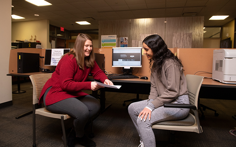 An Elgin Community College Financial Aid Officer assists a student