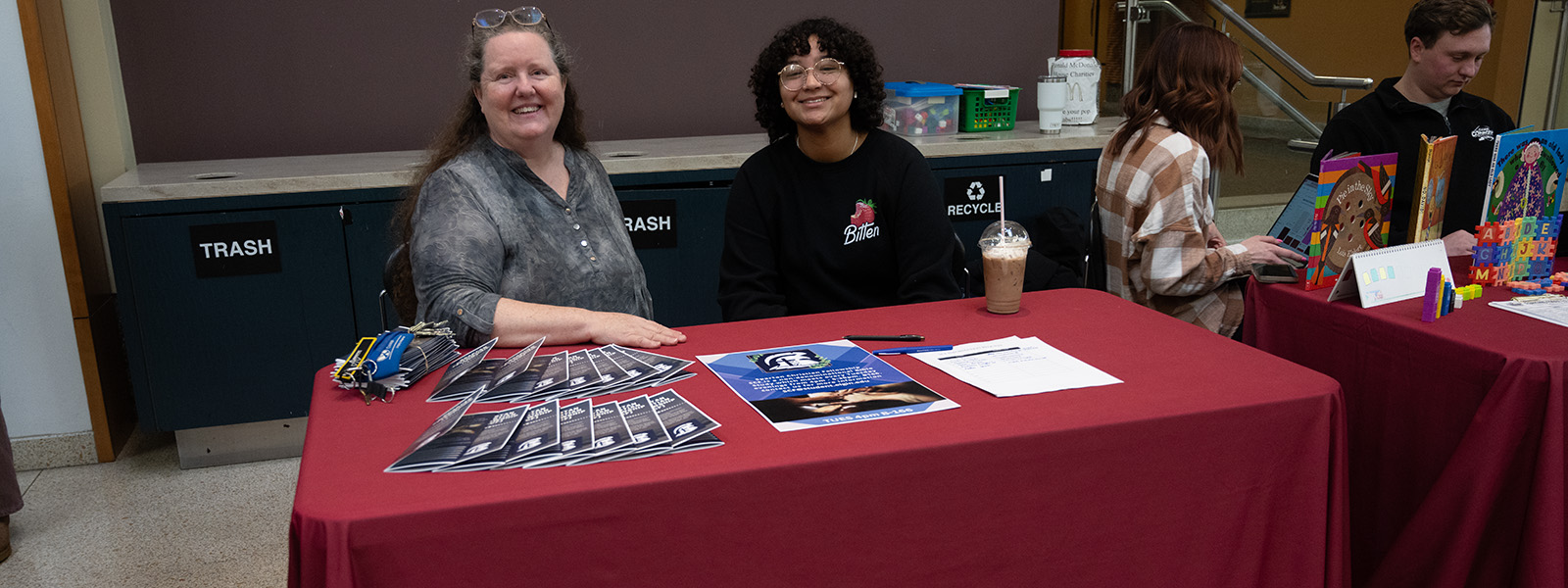 Members of the Spartan Christian Fellowship sitting at a table.