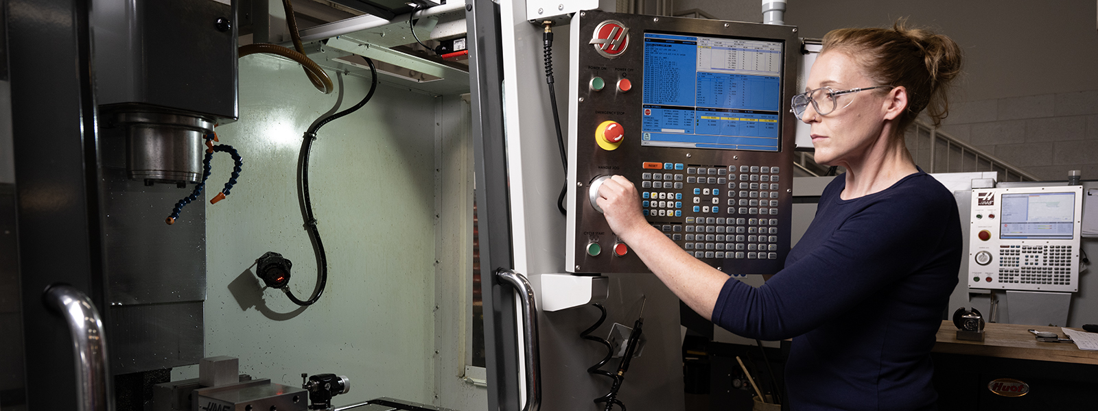 Student using a CNC Machine